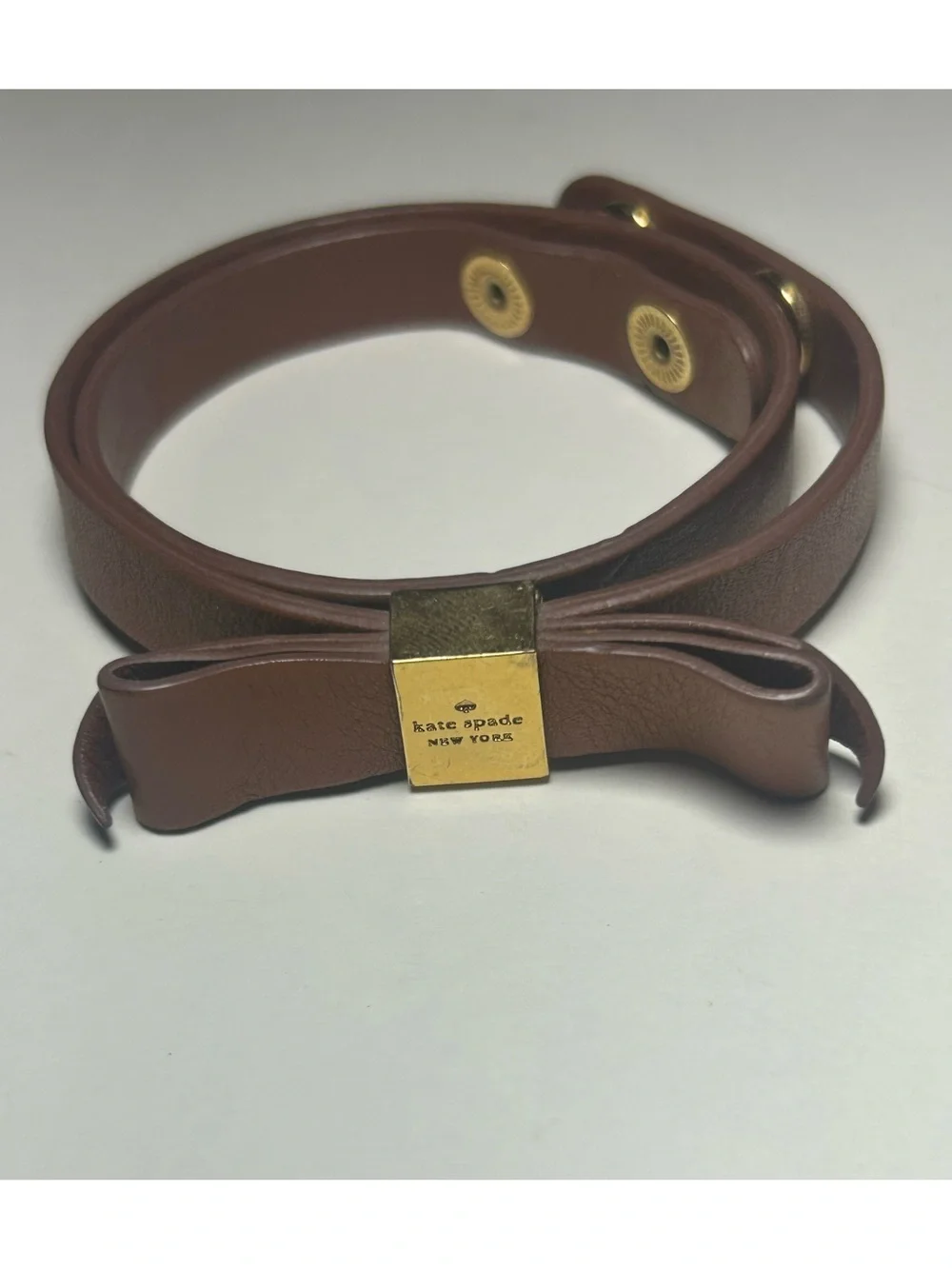 Kate Spade Brown Leather Wrap Bracelet – Gold‑Tone Bow Clasp